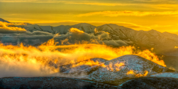 Breaking Storm & Backlit clouds on the Oquirrp Mountains,Ut.
