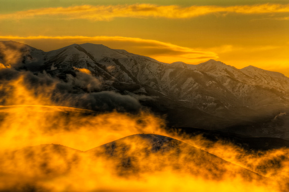 Breaking Storm & Backlit clouds on the Oquirrp Mountains,Ut.