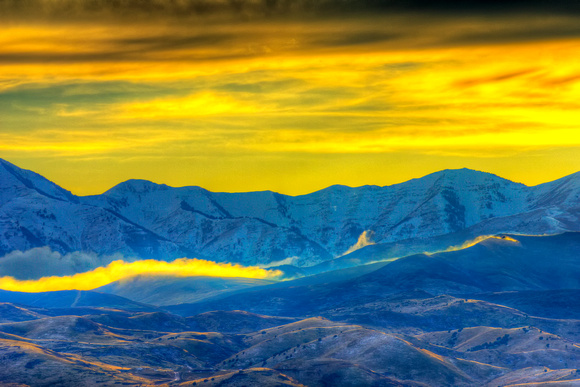 Breaking Storm & Backlit clouds on the Oquirrp Mountains,Ut.