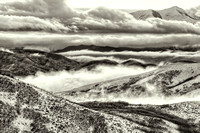 Breaking Storm & Backlit clouds on the Oquirrp Mountains,Ut.