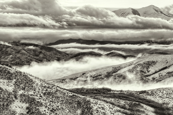 Breaking Storm & Backlit clouds on the Oquirrp Mountains,Ut.